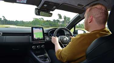 Auto Express news reporter Ellis Hyde driving the facelifted Renault Clio in the UK
